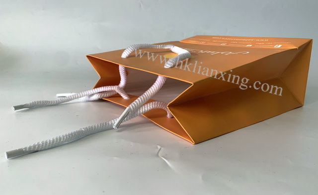 Paper board Orange Apparel Paper Bag